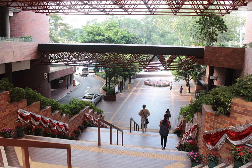 Red-brick architecture and walkways on The Hong Kong Polytechnic University campus